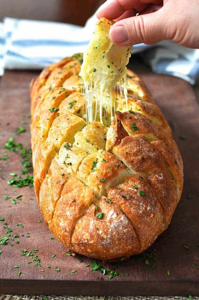 Cheese and garlic crack bread - this cheesy garlic bread is outta this world! recipetineats.com
