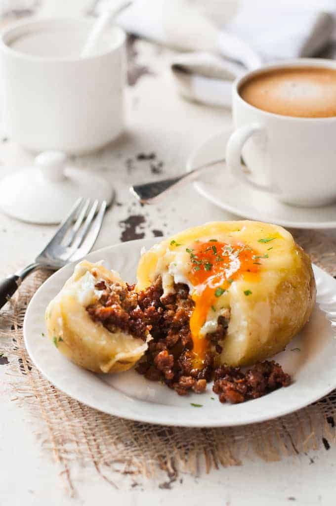 Sausage and Egg Breakfast Potato Skins cut open showing insides