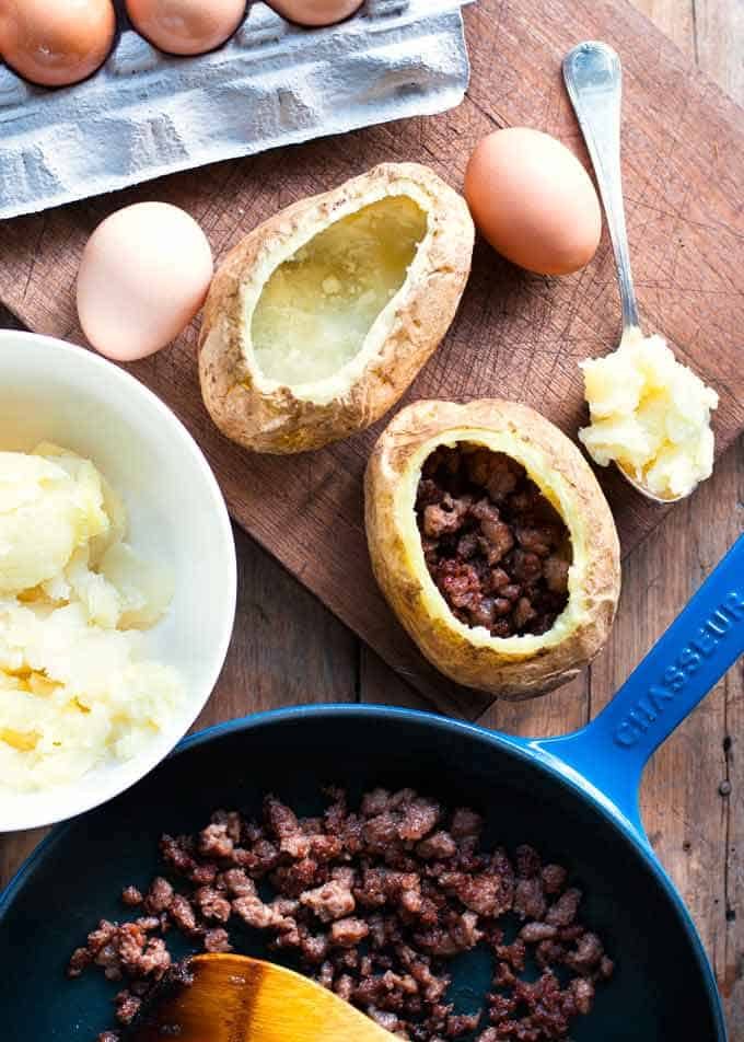 Making Sausage Egg Stuffed Potatoes