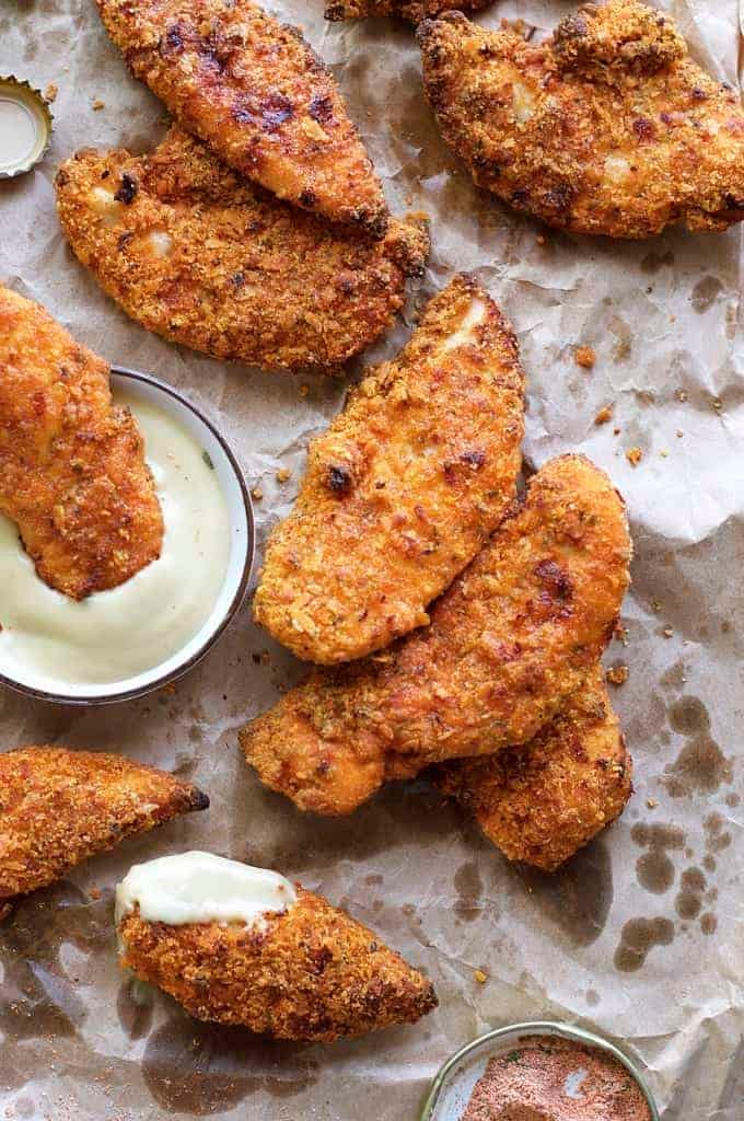 Oven Fried Chicken Tenders - tastes just like KFC, with a crunchy coating, 11 Secret Herbs & Spices and a fraction of the calories! recipetineats.com