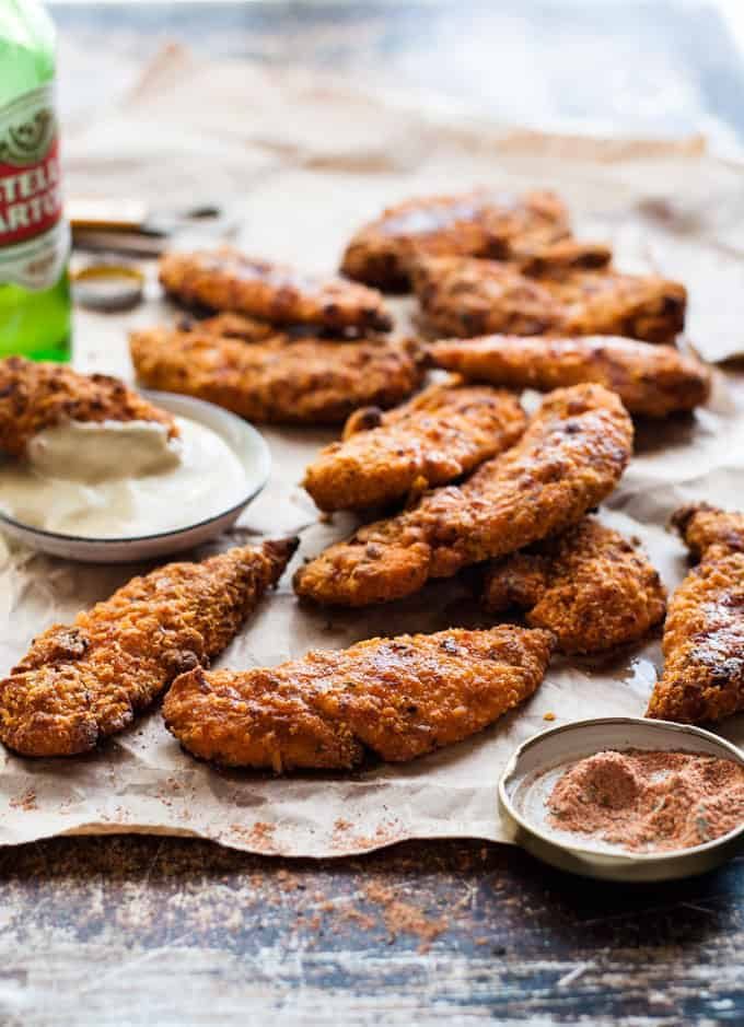 Oven Fried Chicken Tenders - tastes just like KFC, with a crunchy coating, 11 Secret Herbs & Spices and a fraction of the calories! recipetineats.com