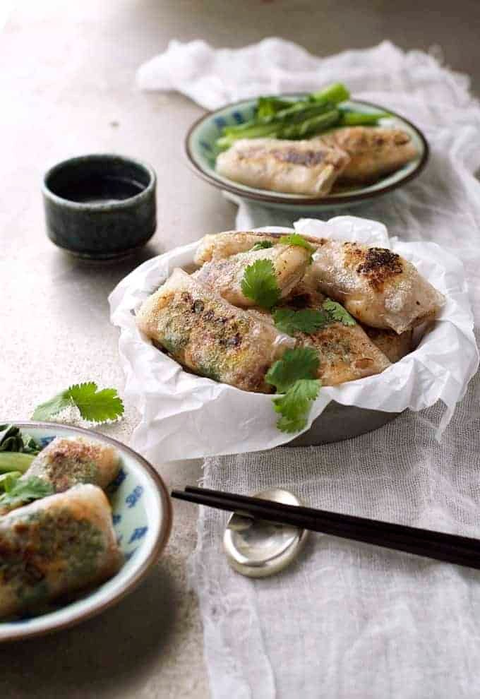 Bowl of Crispy Chinese Rice Paper Wrapped Fish with chopsticks