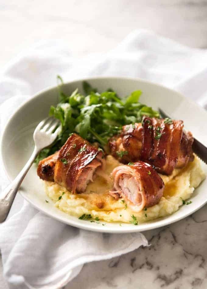 Bacon Wrapped Chicken - A spectacular way to dress up chicken with just a few simple ingredients! Brown sugar is the key to creating a gorgeous glaze on the bacon. recipetineats.com