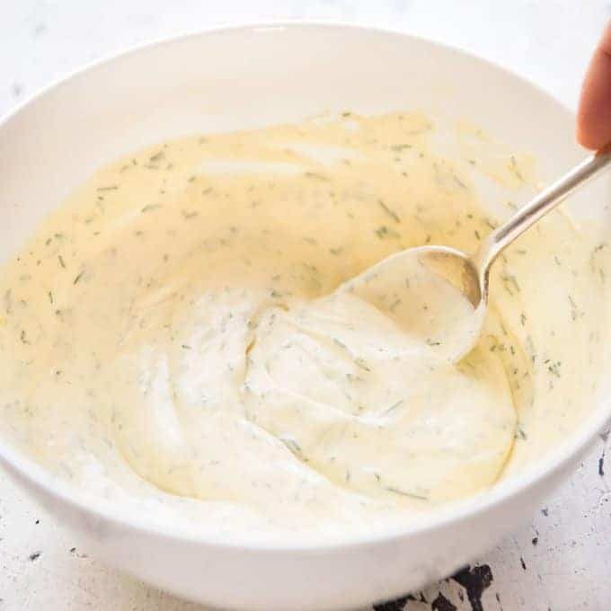 Creamy Dill Sauce for Salmon or Trout - A simple, refreshing sauce that pairs beautifully with rich salmon. Dinner on the table in 15 minutes! www.recipeteineats.com