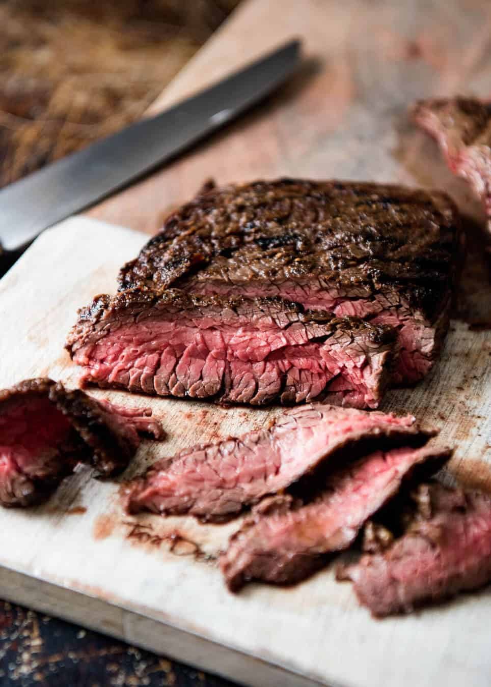 A juicy Steak Sandwich loaded with tender slices of steak, caramelised onion, garlic aioli, lettuce, tomato and mustard. www.recipetineats.com