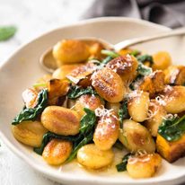 Pan Fried Gnocchi with Pumpkin and Spinach - Golden crispy on the outside, soft on the inside, with a butter sage sauce, roasted pumpkin and spinach. www.recipetineats.com