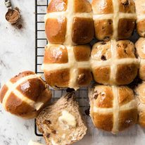 Easy Hot Cross Buns Recipe - perfectly spiced, fluffy and moist, with a no knead, no stand mixer option! www.reciptineats.com