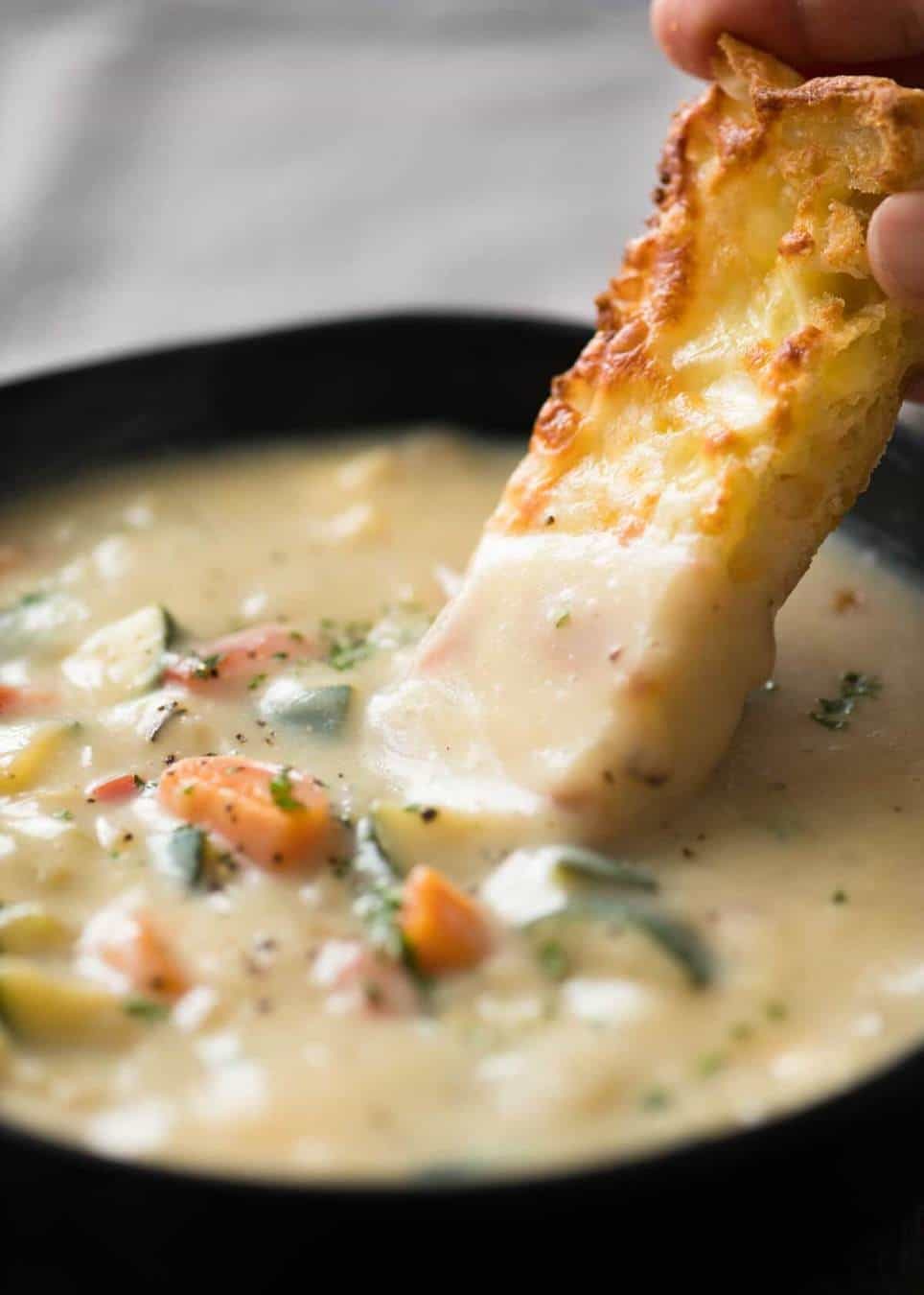 It's a miracle - this Creamy Healthy Vegetable Soup is super low cal, low carb, gluten free and unbelievably tasty. The secret: peeled zucchini, cauliflower, onion and garlic cooked then pureed. Imagine the possibilities! recipetineats.com