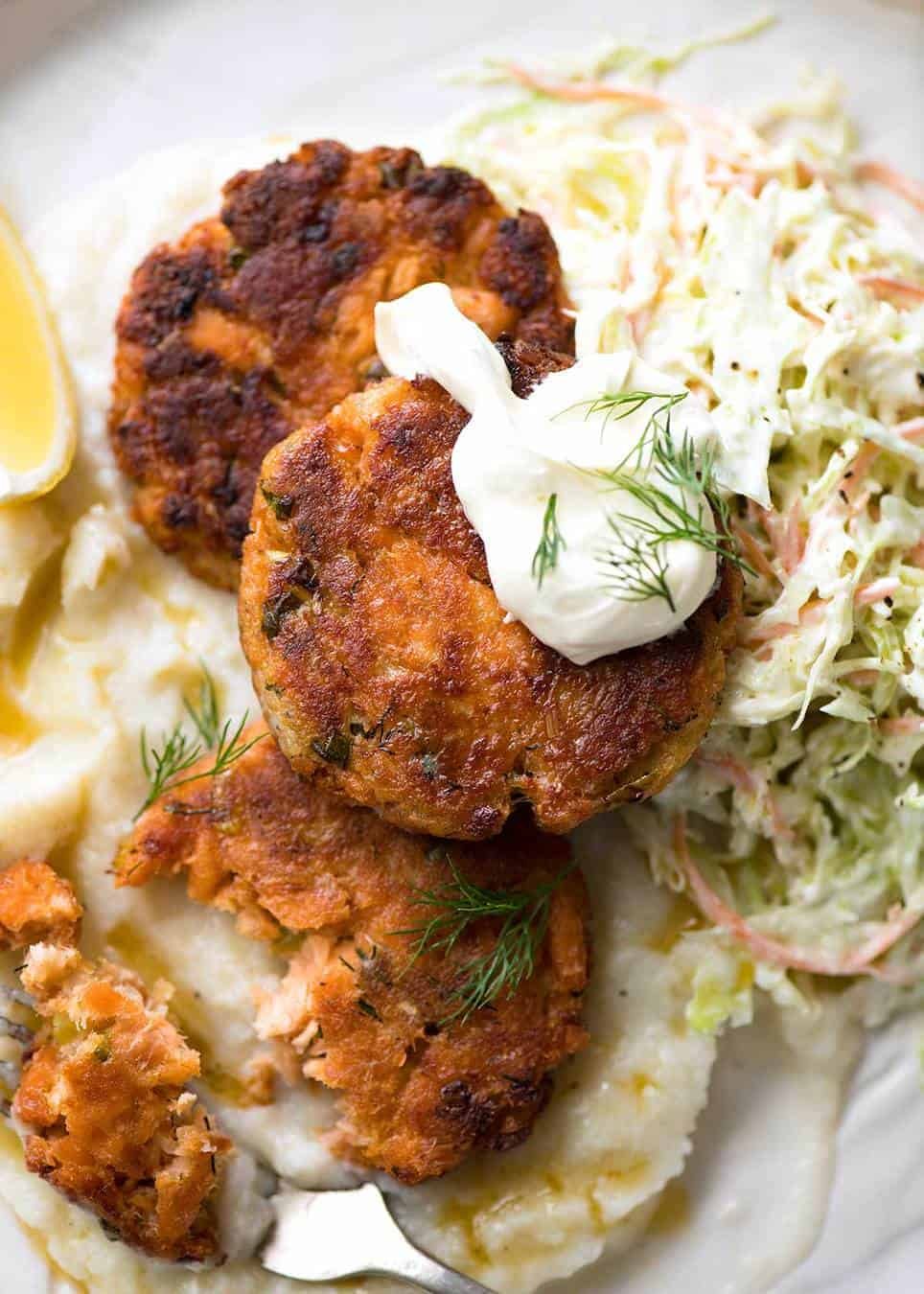 Tender insides studded with flakes of salmon, golden on the outside, these Salmon Patties are baked, not fried. Ultimate transformation of canned salmon - or use fresh! recipetineats.com