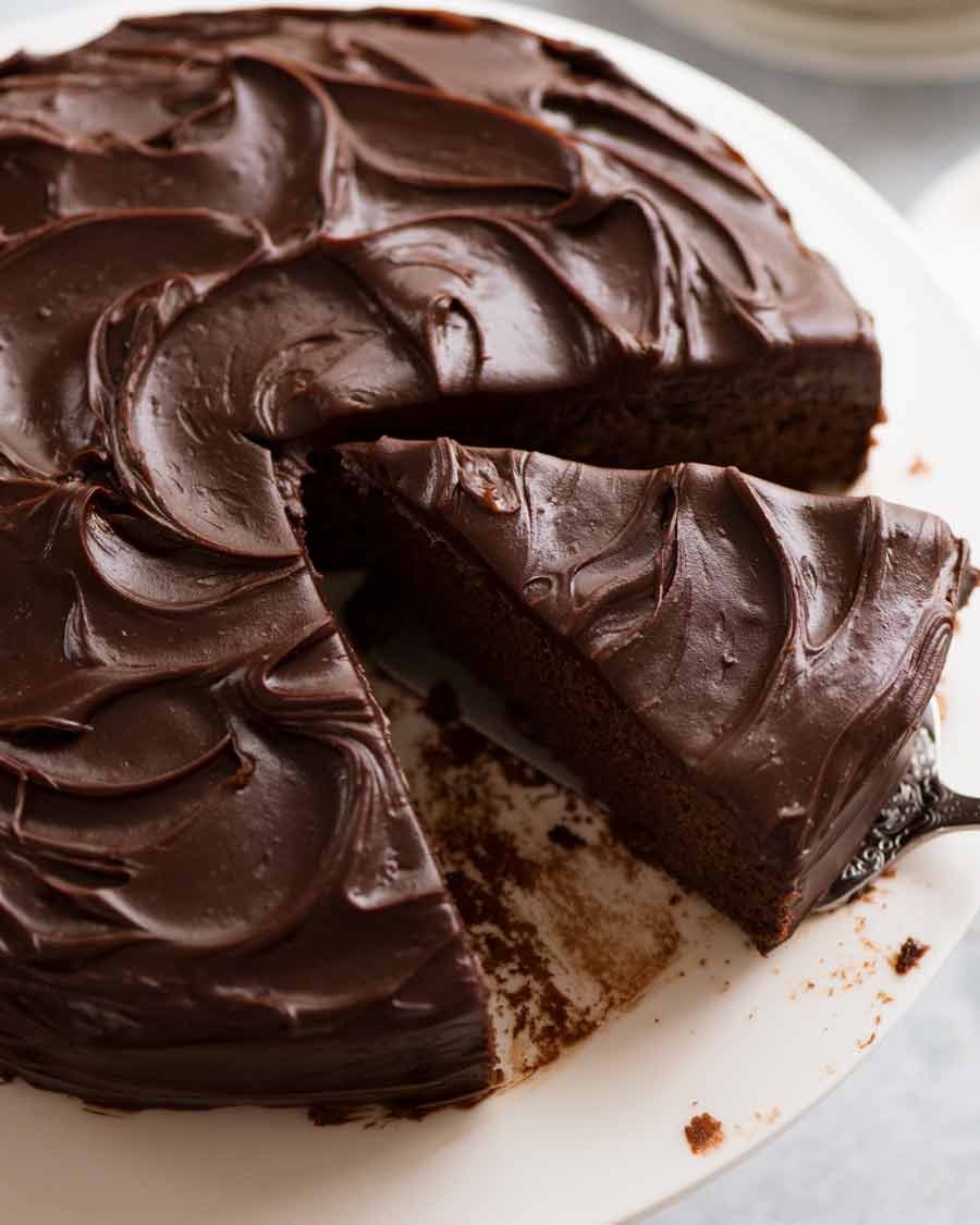 Easy Chocolate Fudge Cake being cut