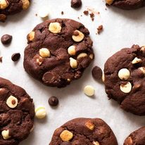 Overhead photo of Triple Chocolate Cookies on a cookie sheet - filled with 40% chocolate!