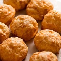 Tray filled with freshly baked Gougeres (Cheese Puffs)