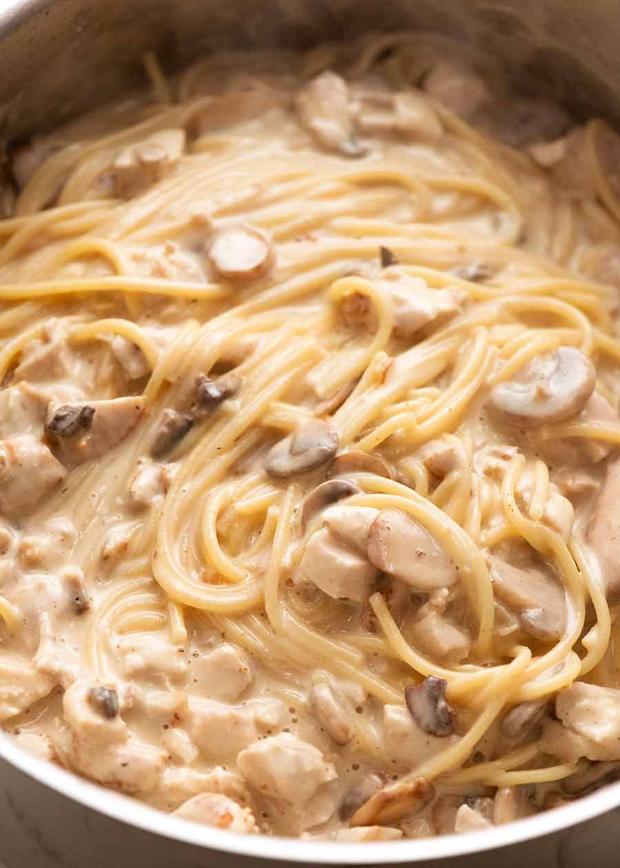 Pot of creamy Chicken Tetrazzini ready to be baked