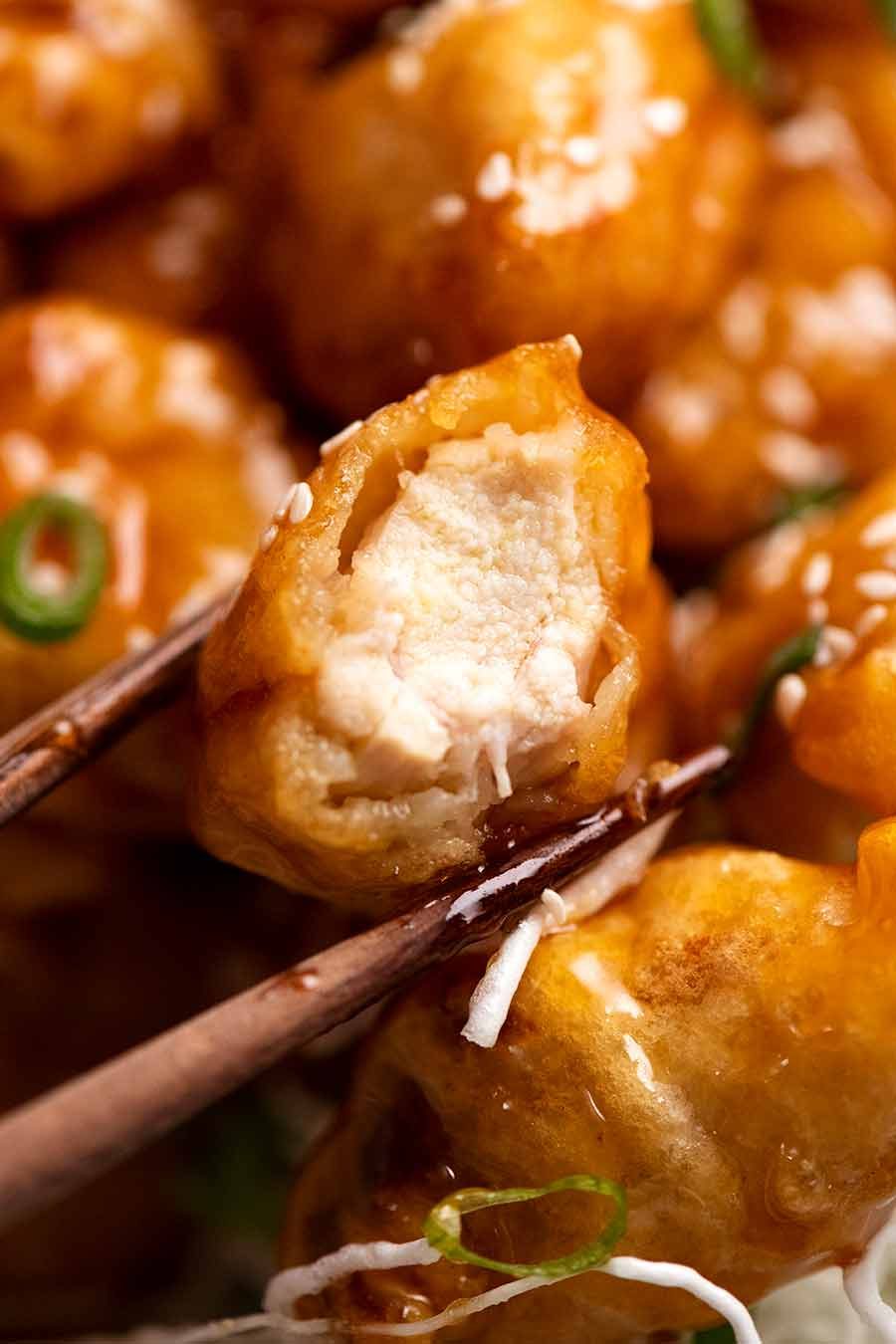 Close up showing inside of crispy Honey Chicken