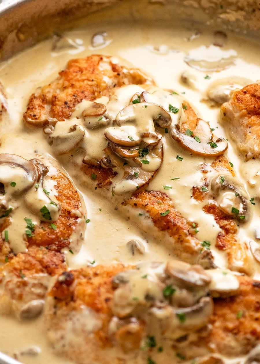 Chicken in Creamy Mushroom sauce in a skillet, ready to be served