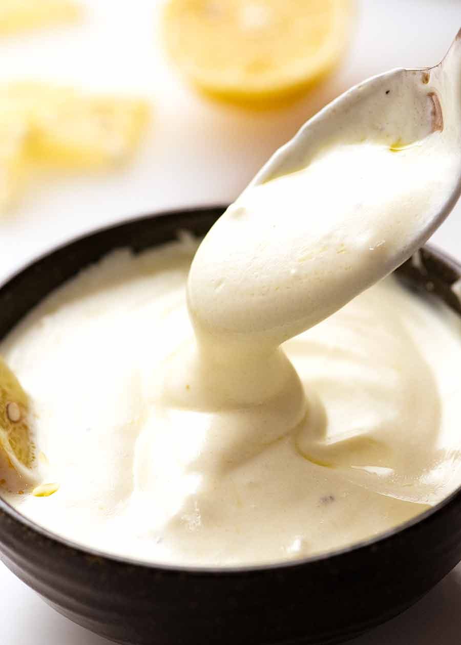 Spoon scooping up Lemon Yogurt Sauce
