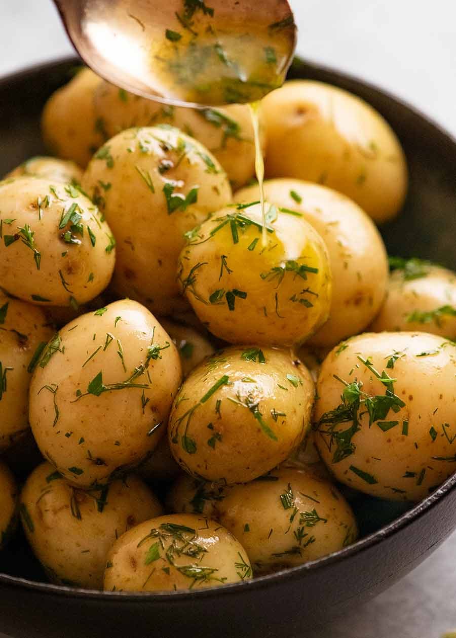 Drizzling butter of Baby Potatoes with Butter & Herbs