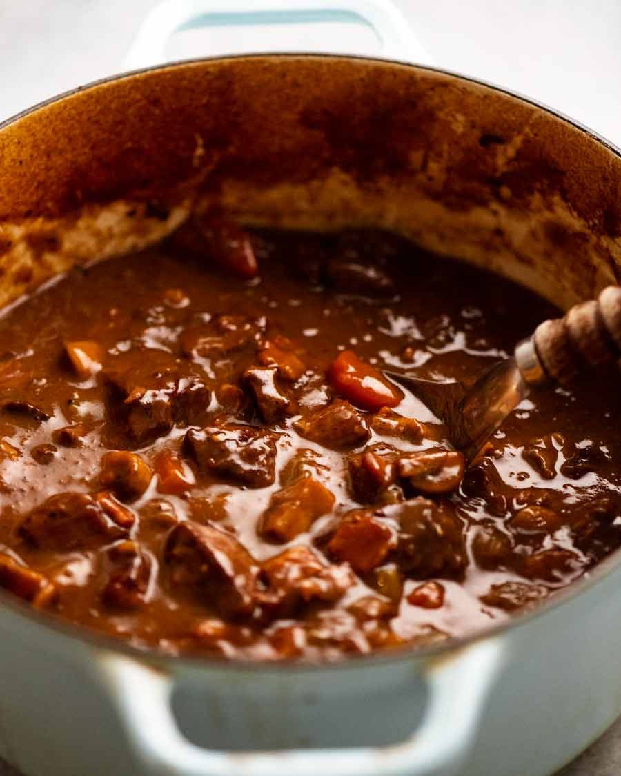 Close up of pot of slow cooked beef filling for Family Meat Pie