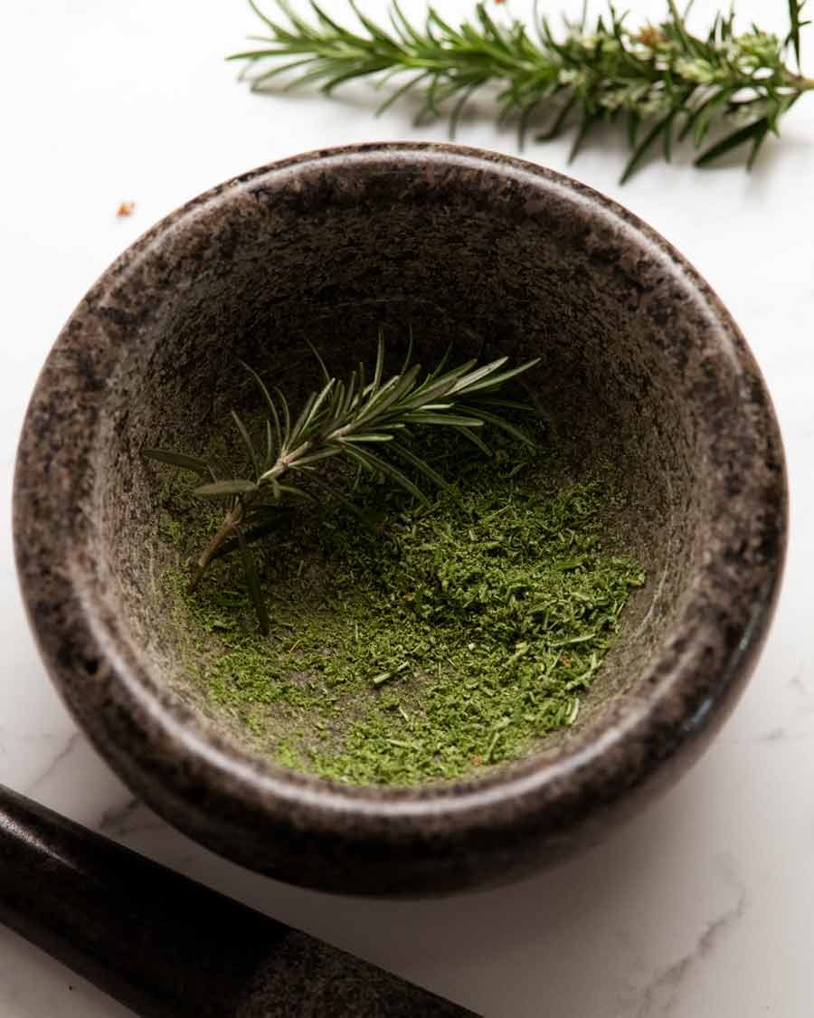 Grinding rosemary for rosemary salt